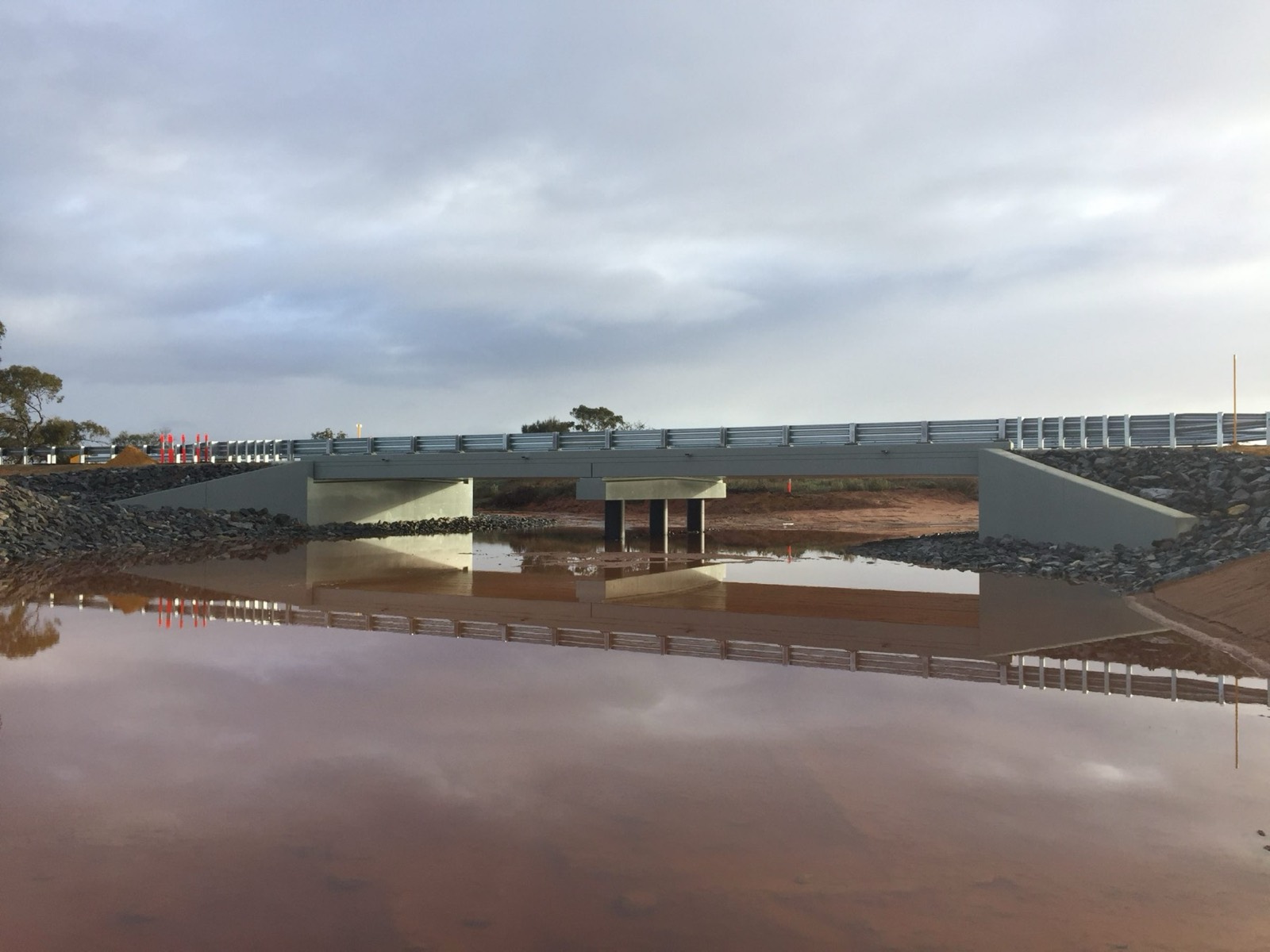 Three Springs Bridge reflected in water